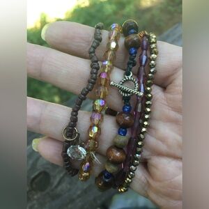 Beaded elastic brackets in shades of tan and brown